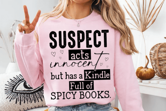 Suspect acts innocent but kindle is full of spicy books SHIRT