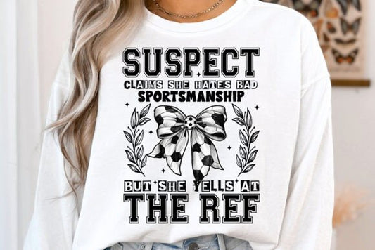 Suspect Claims she hates bad sportsmanship but yells at the Ref Soccer SHIRT