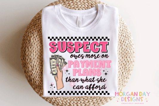 Suspect owes more on payment plans than what she can afford SHIRT